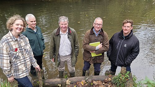 Anna with Alistair Carmichael in River Frome